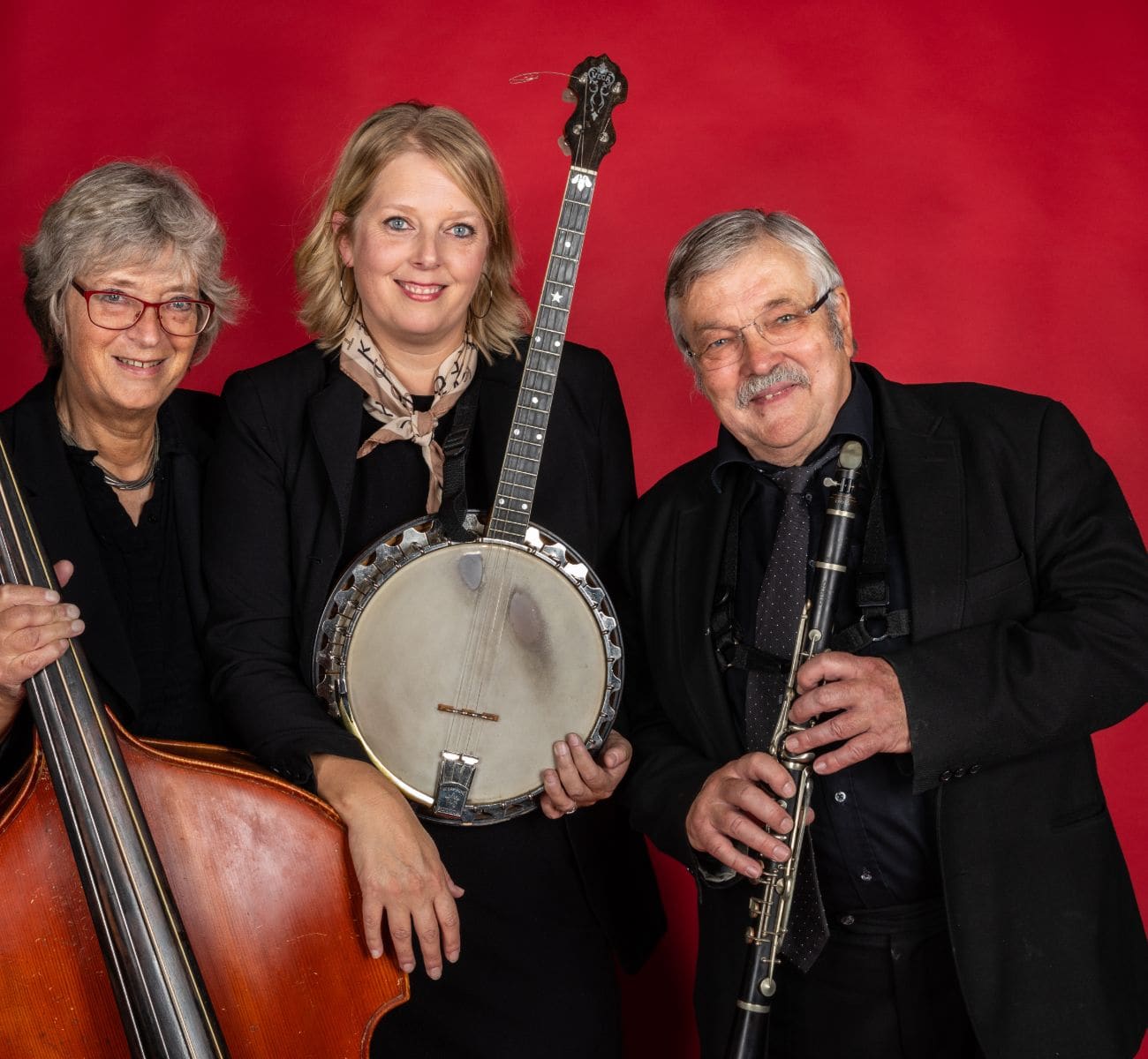 Jensens Jazz tre personer med instrumenter
